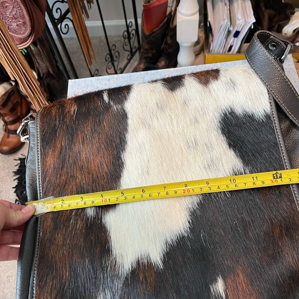 Cowhide bag and can fit a lot of stuff and still be organized!